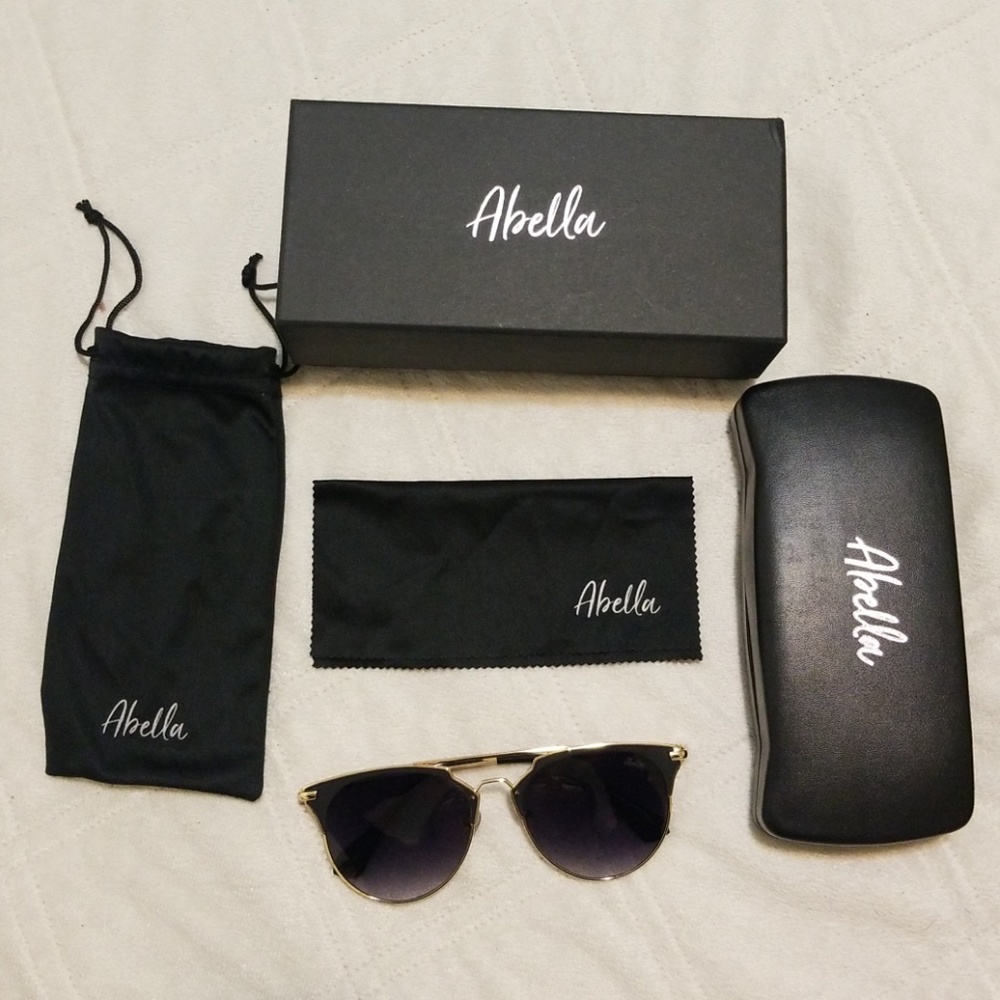 Abella action gold black sunglasses